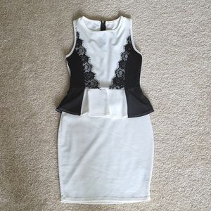 White mini dress with black lace and peplum detail
